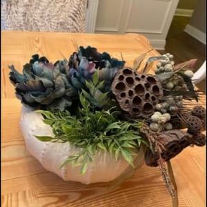 Floral Arrangement in white pottery. Faux floral